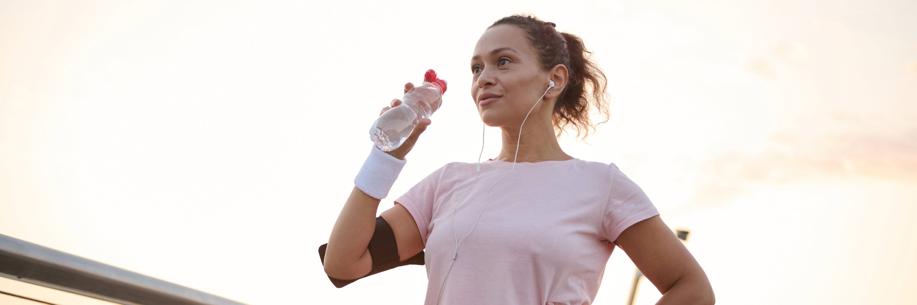 Healthy, confident woman drinking water. Holistic Health Products, Holistic Supplement
