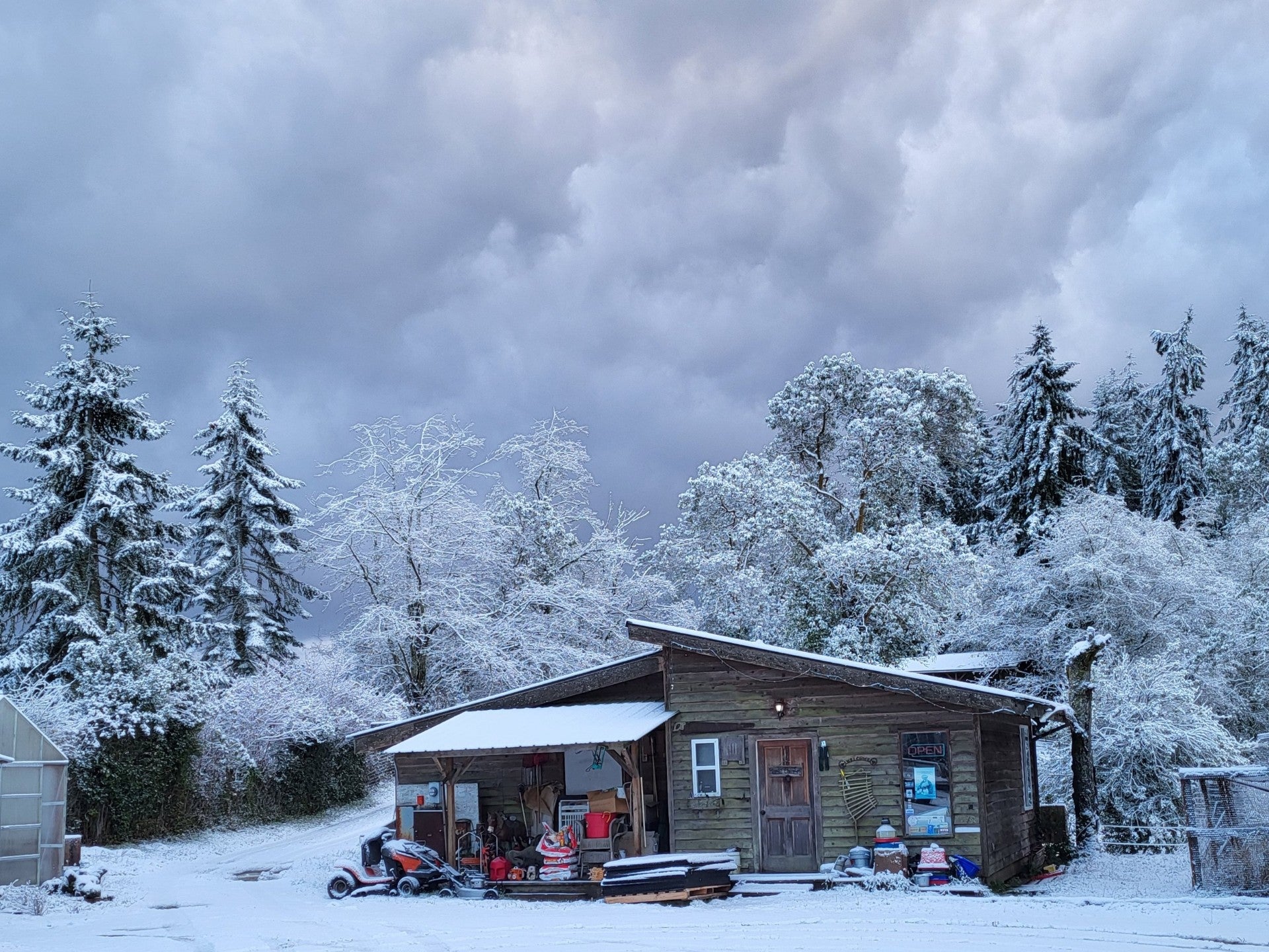 Photo in the winter, of a snow covered store on the Headley Holistics Farm. Beautiful