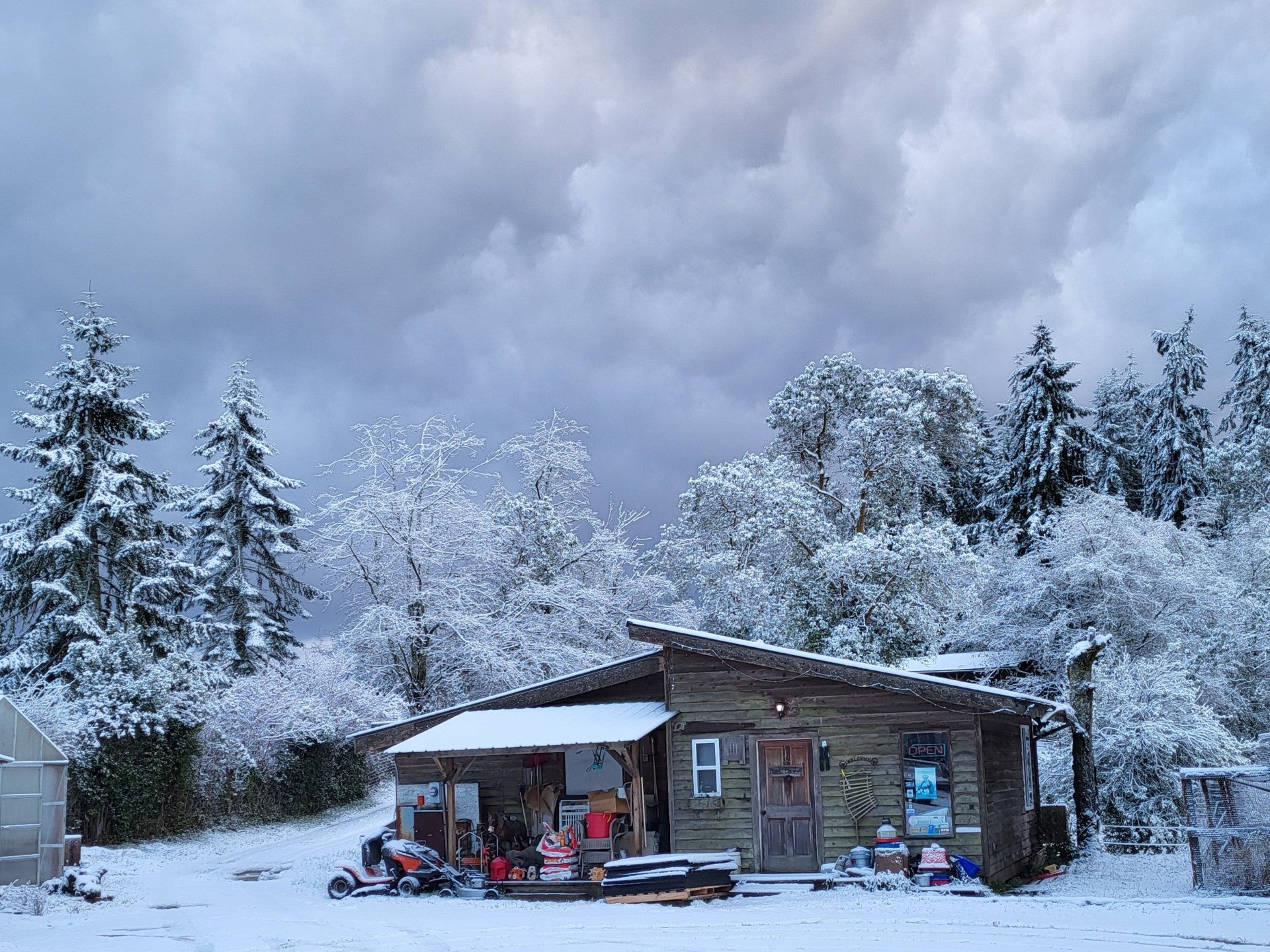 Photo in the winter, of a snow covered store on the Headley Holistics Farm. Beautiful 